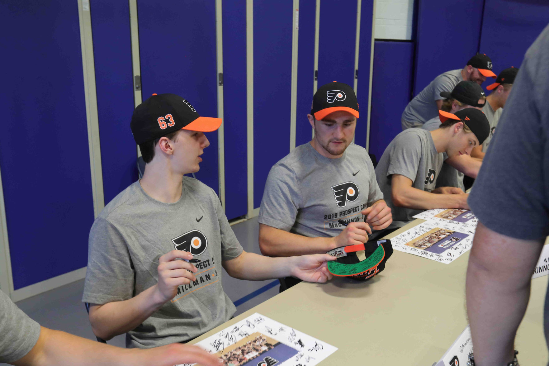 Philadelphia Flyers prospects sign autographs and play volleyball